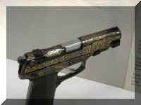 a f0809wcc_341 gun gold in_1.JPG (35436 bytes)